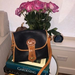 Used Dooney and Bourke all weather leather bag